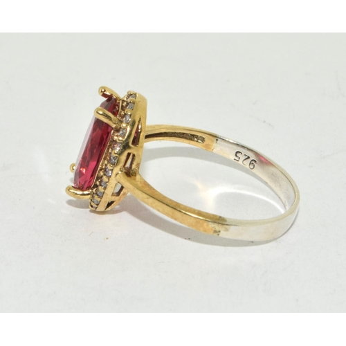 386 - A silver CZ and Tourmaline ring. Size R