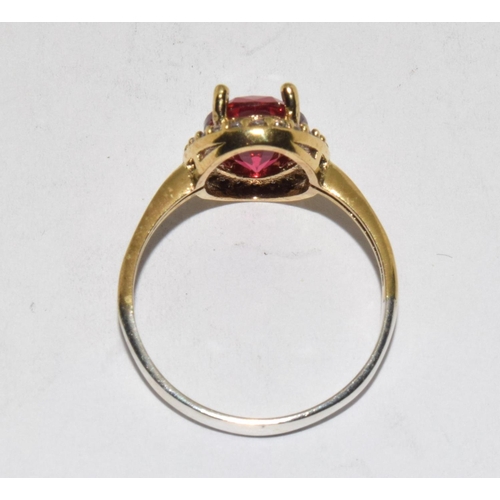 386 - A silver CZ and Tourmaline ring. Size R