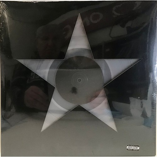 26 - DAVID BOWIE ‘BLACKSTAR’ 180G CLEAR VINYL SEALED & SET OF 3 LITHO GRAPHIC PRINTS. This clear coloured... 