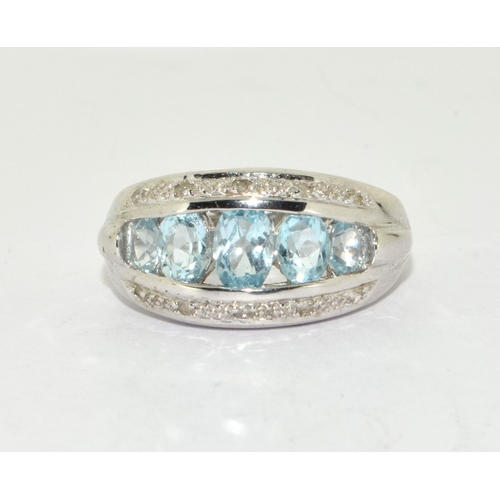 358 - 9ct white gold ladies Diamond and Aquamarine ring size N