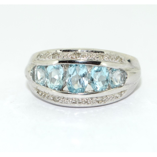 358 - 9ct white gold ladies Diamond and Aquamarine ring size N