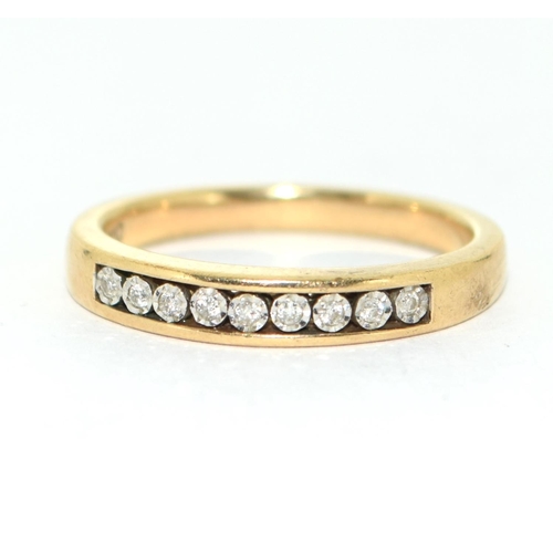 170 - 9ct gold ladies Diamond  channel set 1/2 eternity ring size o