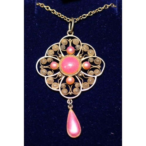 323 - Marius Hammer silver gilt and pink enamel pendant on silver gilt chain. Marked 830s and makers trade... 