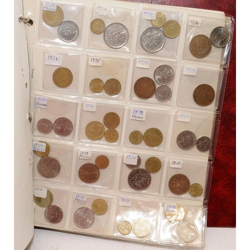 49 - Folder containing a large quantity of coins, including silver examples, issued by France and the Fre... 