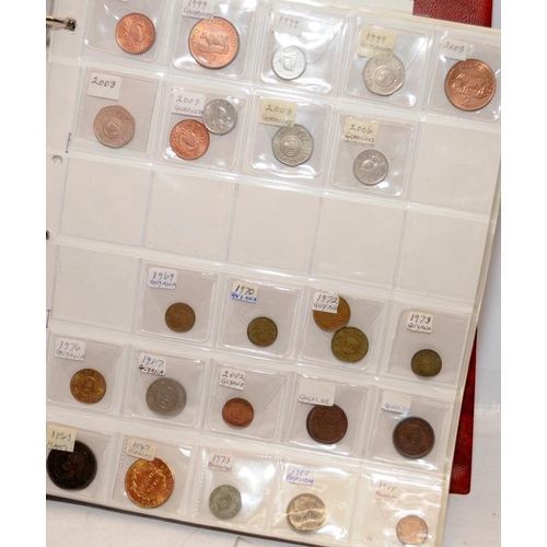 50 - Folder containing a large quantity of World coins. Alphabetically presented from Guatamala through t... 