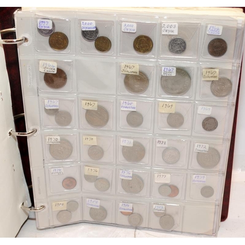 51 - Folder containing a large quantity of World coins. Alphabetically presented from Russia to Southern ... 