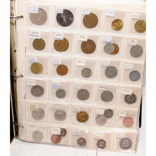 53 - Folder containing a large quantity of World coins. Alphabetically presented from Jamaica through to ... 