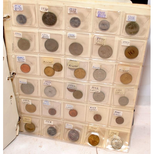 53 - Folder containing a large quantity of World coins. Alphabetically presented from Jamaica through to ... 