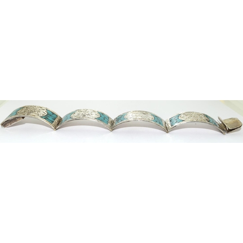 124 - Solid Mexican silver and turquoise bracelet.