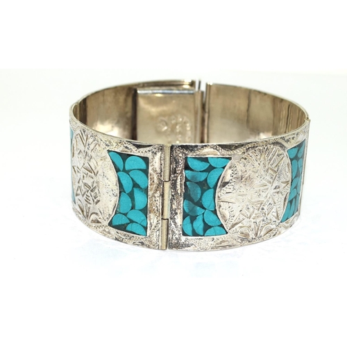 124 - Solid Mexican silver and turquoise bracelet.