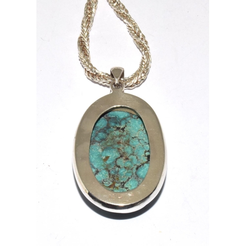 117 - Large turquoise 925 silver pendant on heavy chain.