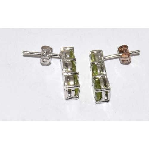 278 - Peridot 925 silver trilogy earrings.