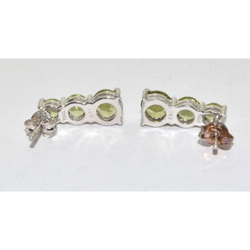 278 - Peridot 925 silver trilogy earrings.