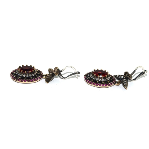 245 - A Pair of substantial Silver Czand Garnet Drop Earrings.