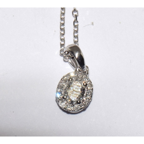 272 - An 18CT W/G diamond Pendant Necklace of 26 points