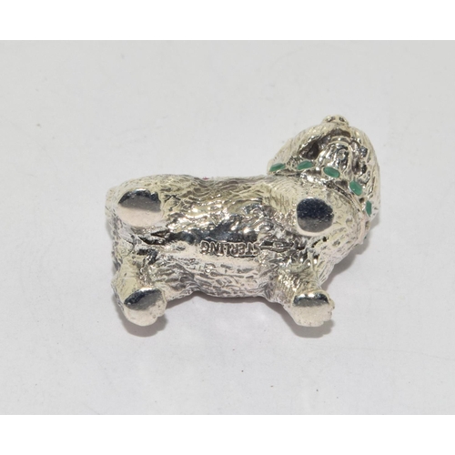 285 - A Silver Dog Pincushion with Emerald Collar