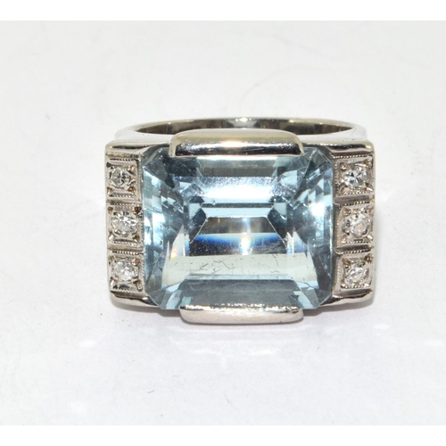 403 - An 18CT W/G Very impressive Aquamarine and Diamond Dress ring of 10CT Approx. 14 x 12mm