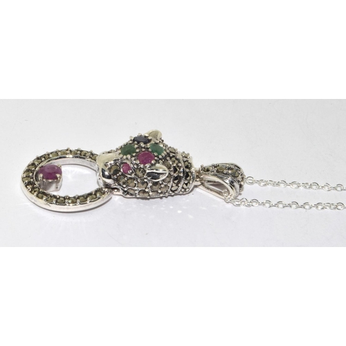 236 - A Silver Leopard Style pendant Necklace inset with Rubies Emeralds and Sapphires