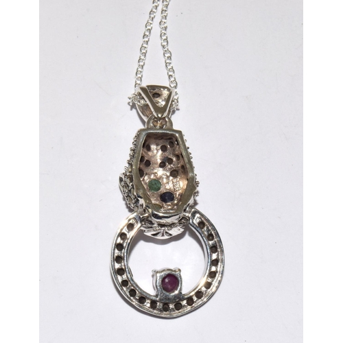 236 - A Silver Leopard Style pendant Necklace inset with Rubies Emeralds and Sapphires