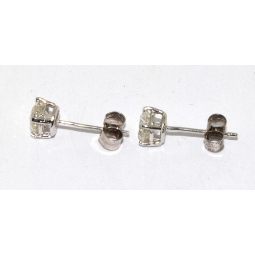 377 - A pair of 14CT W/G Diamond Stud Earrings of 1CT Approx.