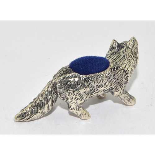 198 - A Silver Fox pincushion with Ruby Eyes