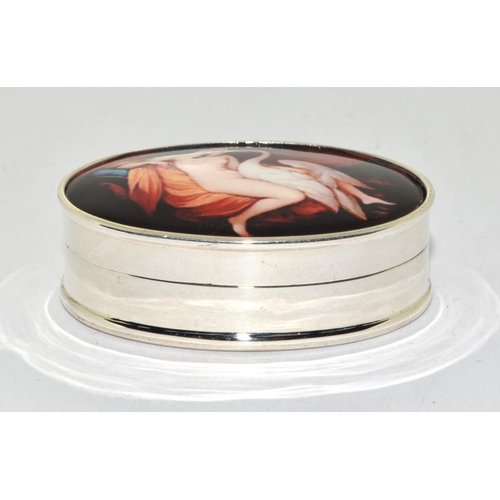 125 - An Oval Shaped pill Box with Nude Enamel Lidded Panel