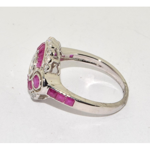 119 - A Silver CZ and Rubillite Art-Deco Style Dress Ring