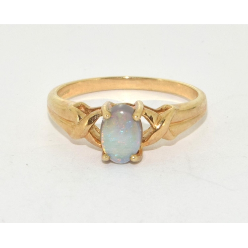 286 - 9ct gold ladies Opal solitaire ring with twist setting size N