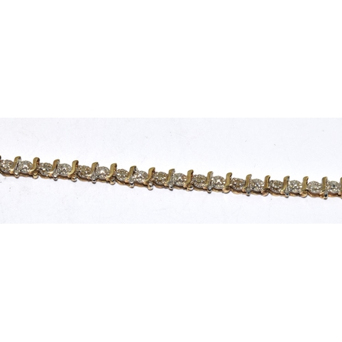 352 - 9ct gold and diamond insert tennis bracelet tight clasp and safety 7