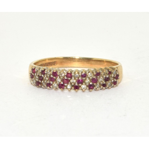 346 - 9ct gold ruby & diamond multi-row half eternity ring size P