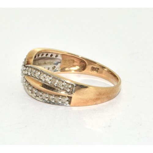 330 - 9ct gold diamond crossover ring  size P