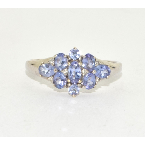 371 - 9ct white gold diamond & Tanzanite cluster ring  size V