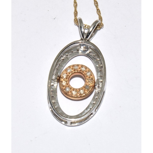 314 - 9ct gold and diamond spinner necklace 4.1g