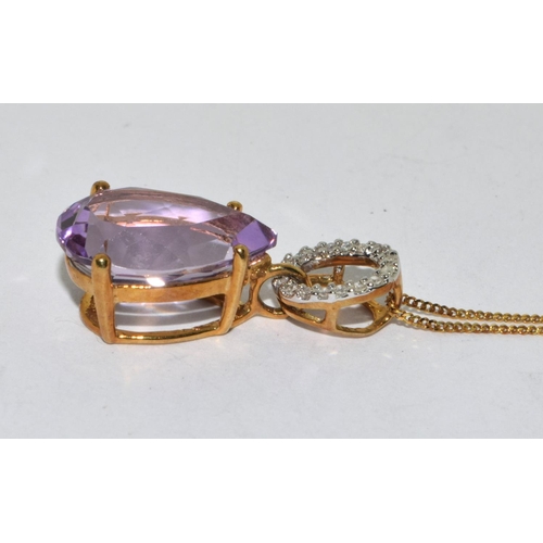 387 - 9ct gold Amethyst and diamond pendant necklace