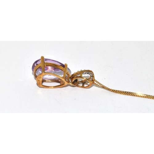 387 - 9ct gold Amethyst and diamond pendant necklace