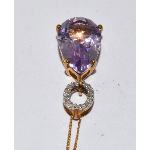 387 - 9ct gold Amethyst and diamond pendant necklace