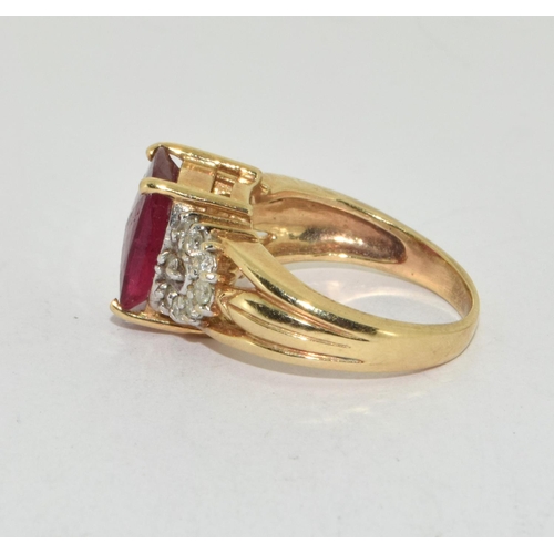 401 - 9ct gold ladies faceted Ruby and diamond shoulder ring size K