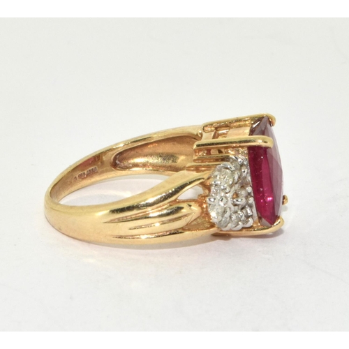 401 - 9ct gold ladies faceted Ruby and diamond shoulder ring size K