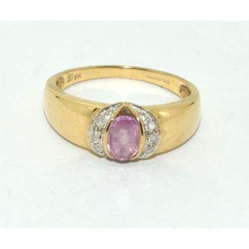 173 - 9ct gold ladies Diamond and Pink sapphire dress ring size M