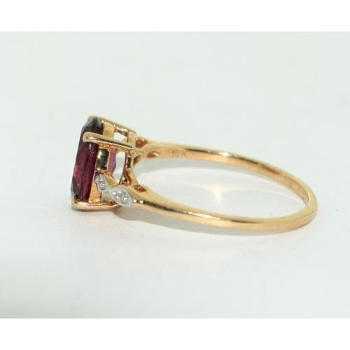 270 - 9ct gold ladies Diamond and Garnet ring size S