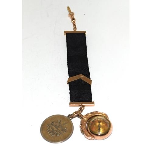 329 - Gold pocket watch hanging strap set with a gold compass fob and a Arabic  coin