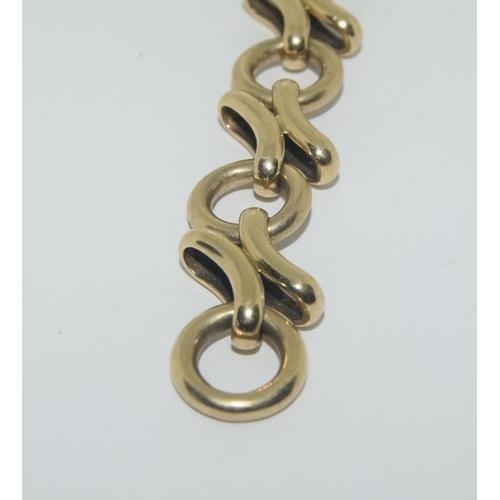 397 - 9ct gold fancy link designed bracelet 21cm ,35g