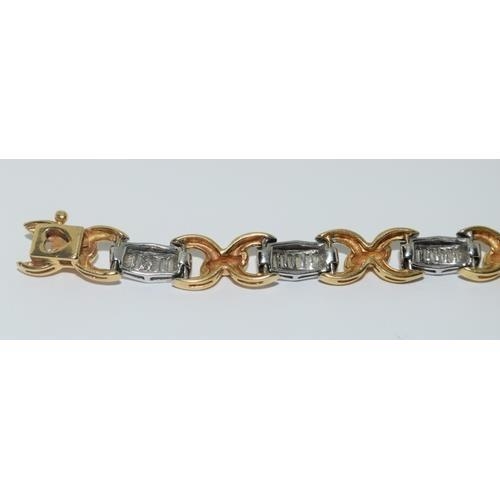 389 - Superb 18ct gold twin colour Diamond bracelet set with bagget cut diamonds approx 2ct total