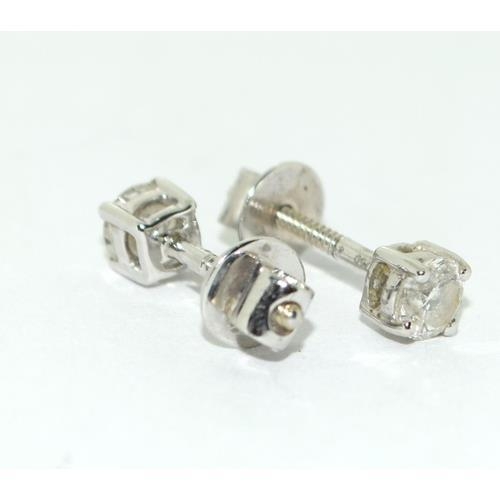 354 - 18ct white gold Diamond ear studs each being approx 0.20ct total approx 0.4ct