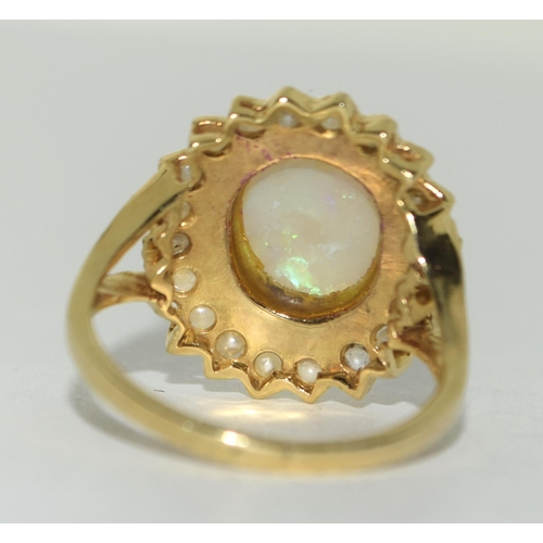 110 - Yellow metal Opal and Pearl ring. Size Q.