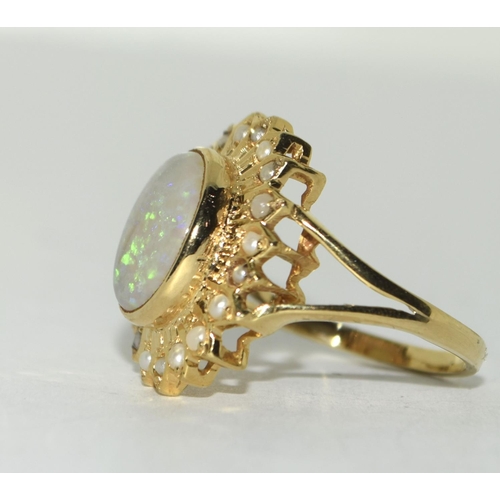 110 - Yellow metal Opal and Pearl ring. Size Q.