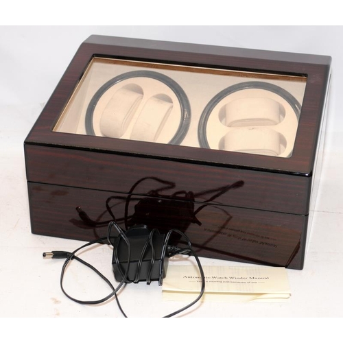 412 - Automatic watch winder with 4 winding heads and storage space for an additional 6 watches.