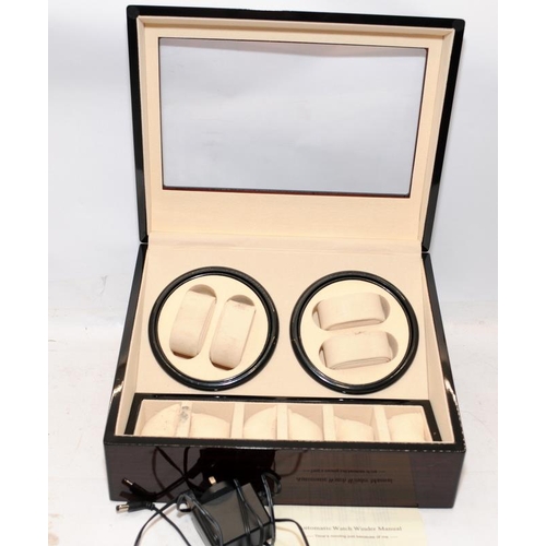 412 - Automatic watch winder with 4 winding heads and storage space for an additional 6 watches.