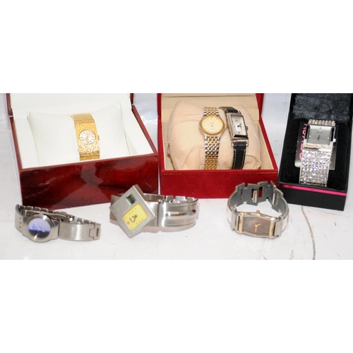 409 - A small collection of ladies watches to include Storm watches