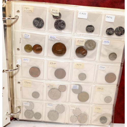 55 - Folder containing a large quantity of World coins. Alphabetically presented from Canada through to C... 